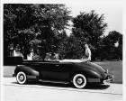 1941 Packard deluxe convertible coupe with two women
