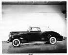 1941 Packard deluxe convertible coupe, left side view, top raised