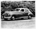 1946 Packard Clipper sedan, seven-eights left side view, parked on grass
