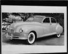1946 Packard Clipper sedan, three-quarter left front view, parked on drive