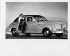 1947 Packard Clipper deluxe sedan studio shot with two women
