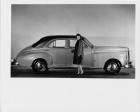 1947 Packard Clipper deluxe, right side view, June Nickel standing at passenger door