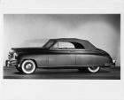 1948 Packard convertible victoria, nine-tenths left side view, top raised
