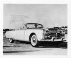 1952 Packard Pan American sports car, seven-eights right side view, man behind wheel