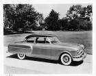 1953 Packard Clipper sedan, right side view, parked on drive