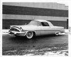 1954 Packard Panther-Daytona, seven-eights left side view, top raised, parked next to brick building