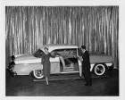 1955 Packard Clipper Constellation on display with man and woman