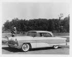 1956 Packard Clipper, woman behind wheel, woman standing at front of car