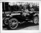 1908 Packard runabout on Hollywood movie set with Polly Moran and Anita Page