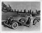 1932 Packard coupe roadster and owner Madge Evans with golf clubs