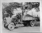 1917-18 Packard dump truck of W.T. Flannery Trucks for Hire with load of dirt